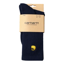 Navy crew socks in a cardboard sleeve